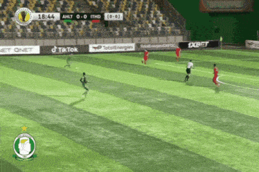 a soccer game is being played on a field with ads for tiktok and 1xbet