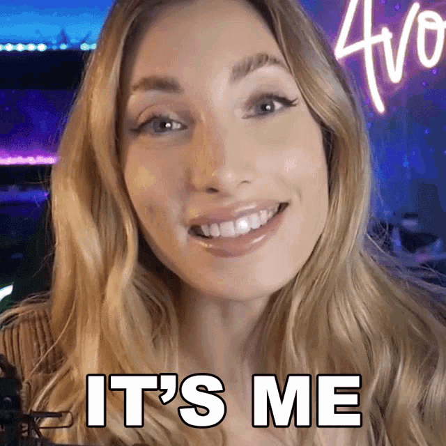 a woman is smiling with the words it 's me on her face