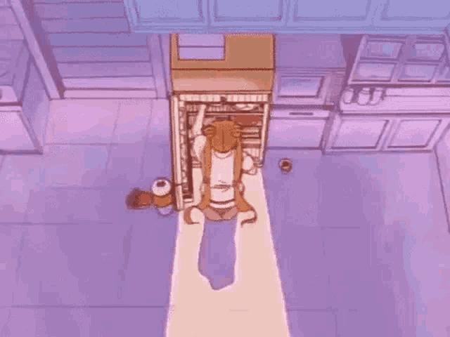 a woman is sitting on the floor in front of a refrigerator .
