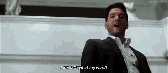 a man in a suit and white shirt is saying i am a devil of my word