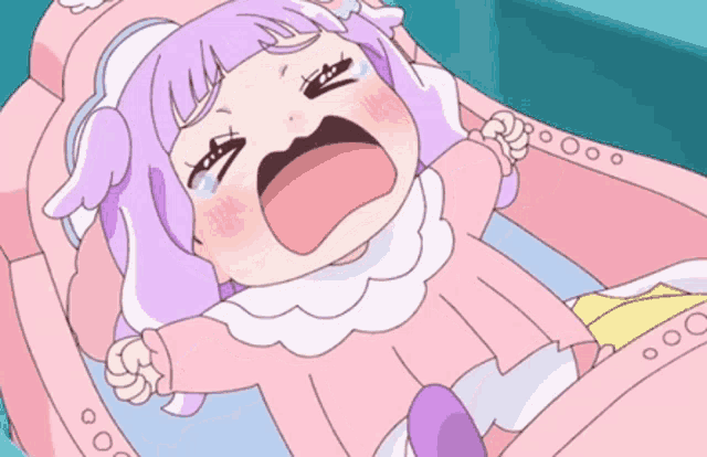 a baby with purple hair is crying in a crib