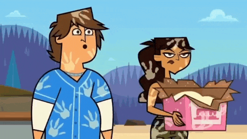 a man and a woman are standing next to each other and the woman is holding a box with a handprint on it