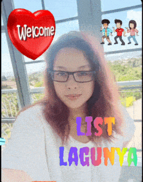a woman wearing glasses stands in front of a window with a welcome heart above her