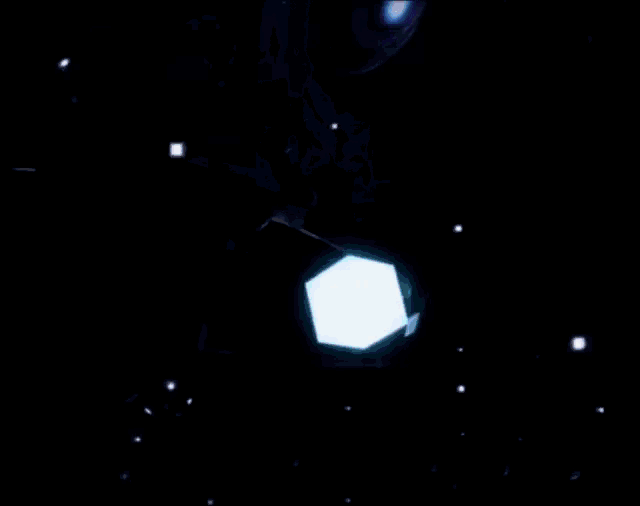 a blue sphere with a white cube in the middle of it