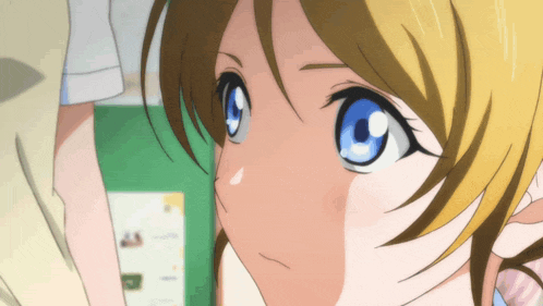 a close up of a girl 's face with a green background