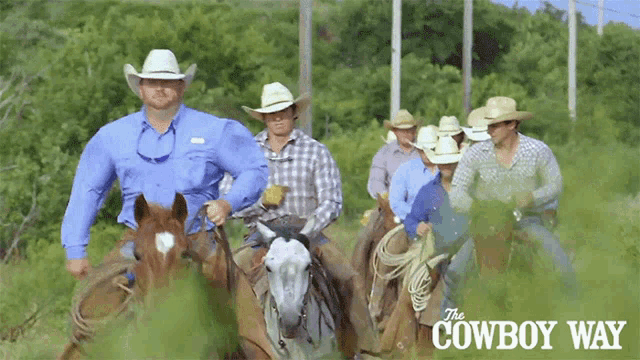 a group of cowboys are riding horses in a field with the cowboy way written on the bottom