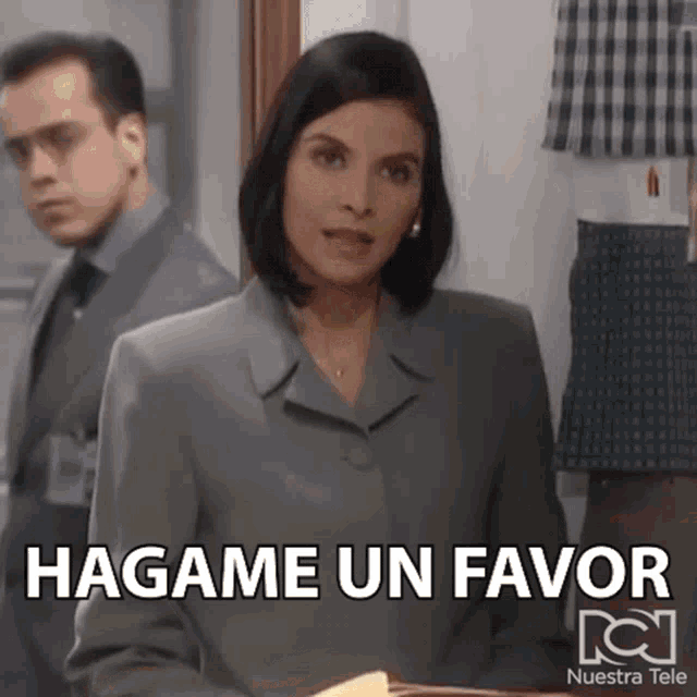 a woman in a suit says " hagame un favor "