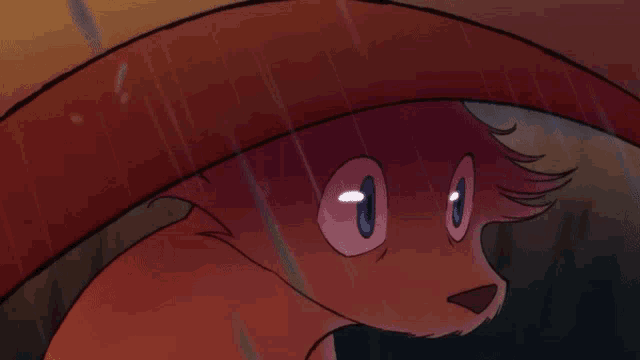 a close up of a cartoon character 's face with blue eyes