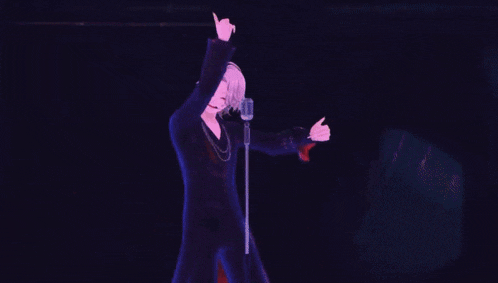 a person is singing into a microphone with a purple background