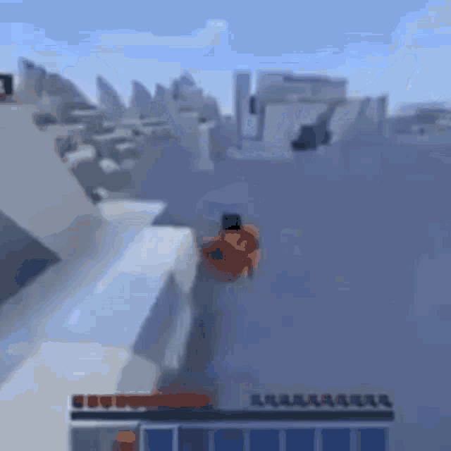 a person is riding a skateboard down a snowy hill .