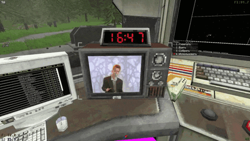 a computer screen shows a clock that says 16:47 on it