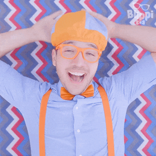 a man laying on a bed with his hands behind his head and the word blippi on the bottom