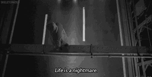 a black and white photo with the words life is a nightmare on it