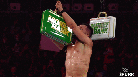 a wrestler is holding a green briefcase that says money bank on it