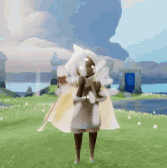 a person is standing in a field in a video game with a white cape on .