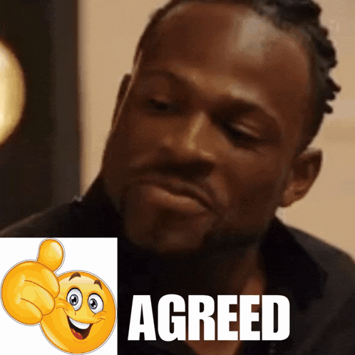 a man giving a thumbs up next to a smiley face and the word agreed
