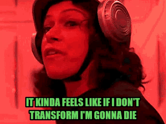 a woman wearing headphones says it kinda feels like if i don 't transform