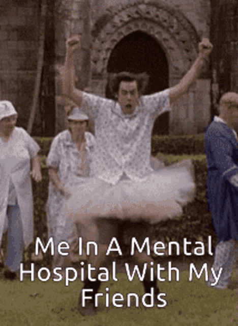 a man in a tutu is jumping in the air with his arms in the air .