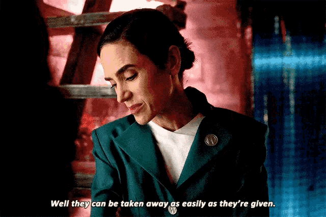 a woman in a green jacket says well they can be taken away as easily as they 're given .
