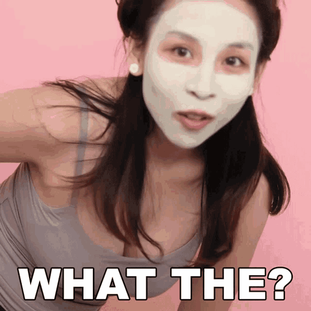 a woman with a white mask on her face is asking what the