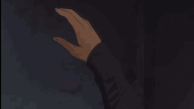 a cartoon character with purple hair and yellow eyes is covering her face with her hands