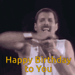 freddie mercury singing into a microphone with the words happy birthday to you