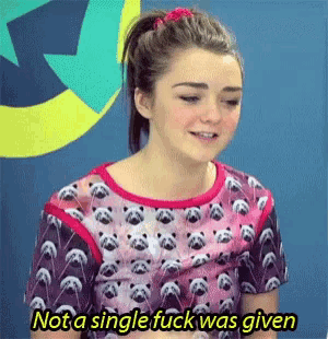 a woman in a pink shirt with pandas on it says not a single fuck was given