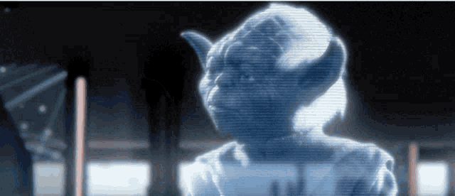 a computer generated image of yoda from star wars appears in a dark room .