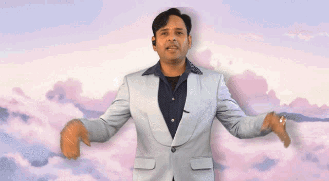 a man in a suit stands in front of a cloudy sky with the words let 's fly above him