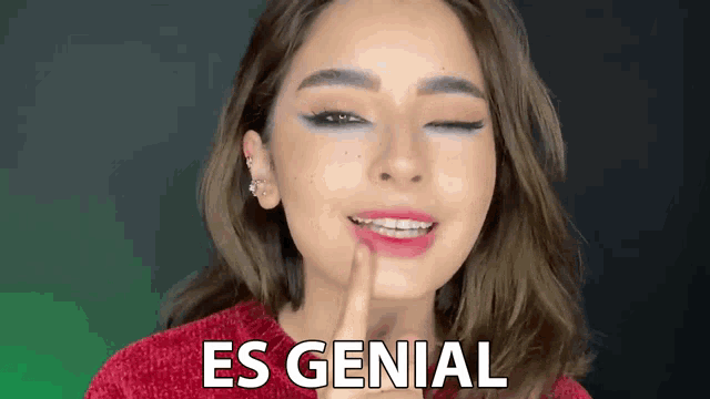 a woman with braces on her teeth is making a funny face and the words es genial are on the bottom of her face .