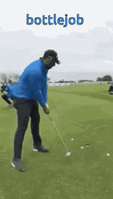 a man in a blue jacket is swinging a golf club on a golf course with the words bottlejob above him .