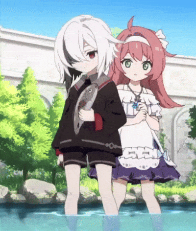 a boy and a girl are standing next to each other in the water .