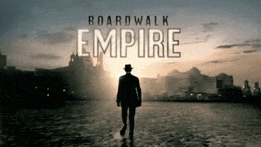 a poster for boardwalk empire with a man in a hat