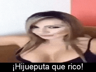a woman with huge breasts is sitting on a couch with the words hijueputa que rico .