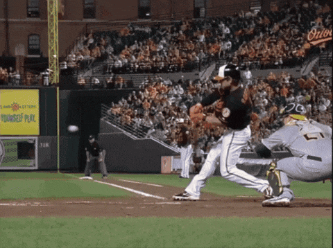 a baseball game is being played in front of a sign that says " yourself place "
