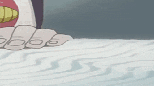a cartoon character with a skull mask on his head is standing in the snow .