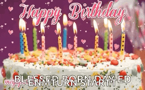 a birthday cake with candles on it and the words `` happy birthday '' written on it .