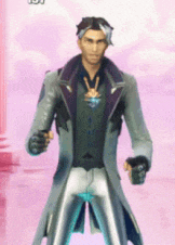 a man in a suit is standing in front of a pink background and giving a peace sign