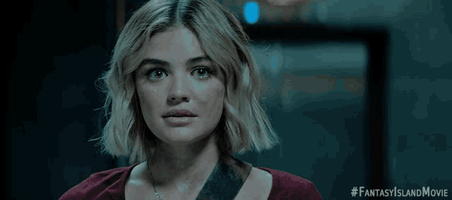 a close up of a woman 's face with a #fantasyislandmovie hashtag
