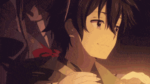 a couple of anime characters hugging each other in a dark room .