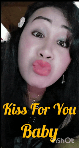 a woman making a funny face with the words kiss for you baby behind her