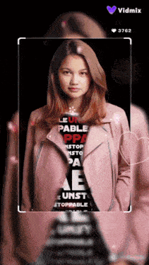 a woman in a pink jacket with the words le unpable ppa on her shirt
