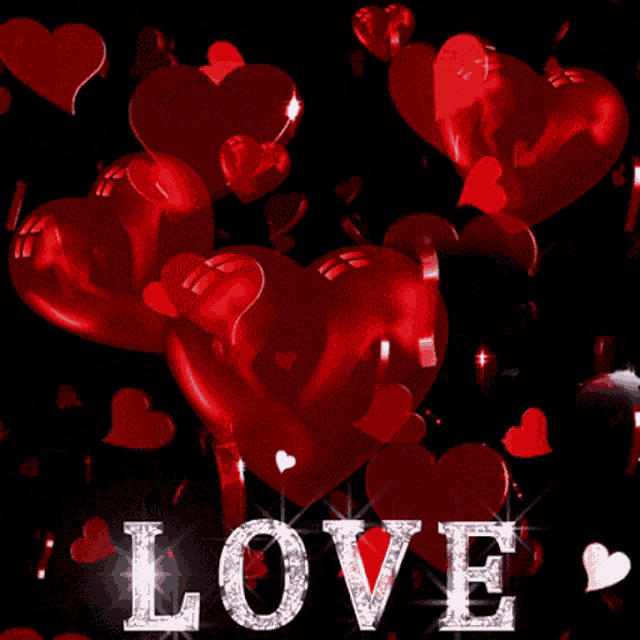 red hearts and the word love on a black background