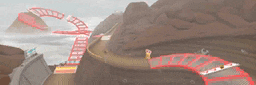 a roller coaster is going down a hill in the middle of a desert .