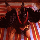 a person with horns and wings is laying on a striped blanket