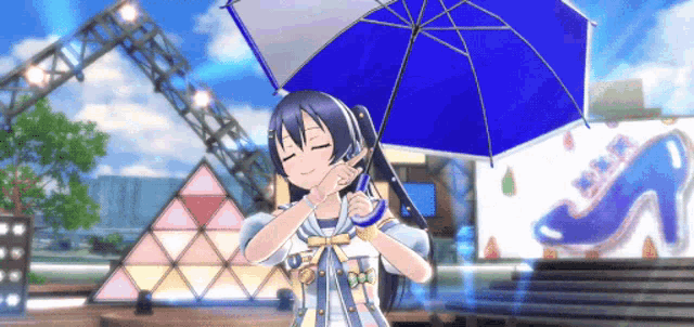 a girl is holding a blue umbrella in front of a sign that says i love you