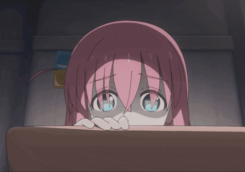 a girl with pink hair and blue eyes looks at something