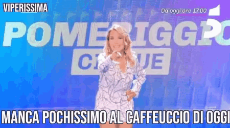 a woman is dancing in front of a sign that says pomeriggio club