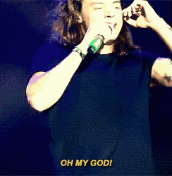 a man singing into a microphone with the words oh my god written below him