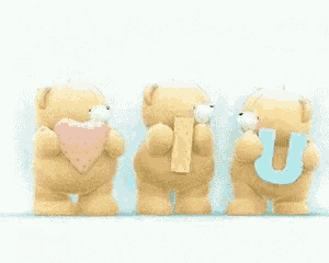 three teddy bears standing next to each other holding the letter u